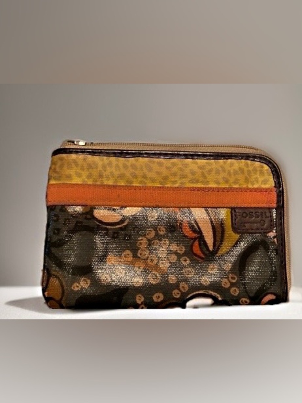 Fossil- coated canvas wristlet wallet